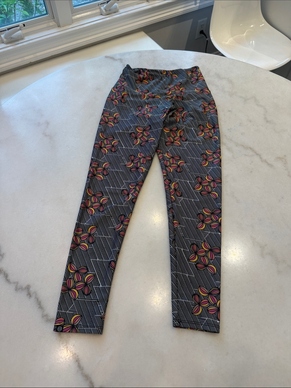 Onzie Black Striped Leggings with Pink & Yellow Floral Motif